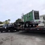 Pickup Truck Transporting Wheeled Container