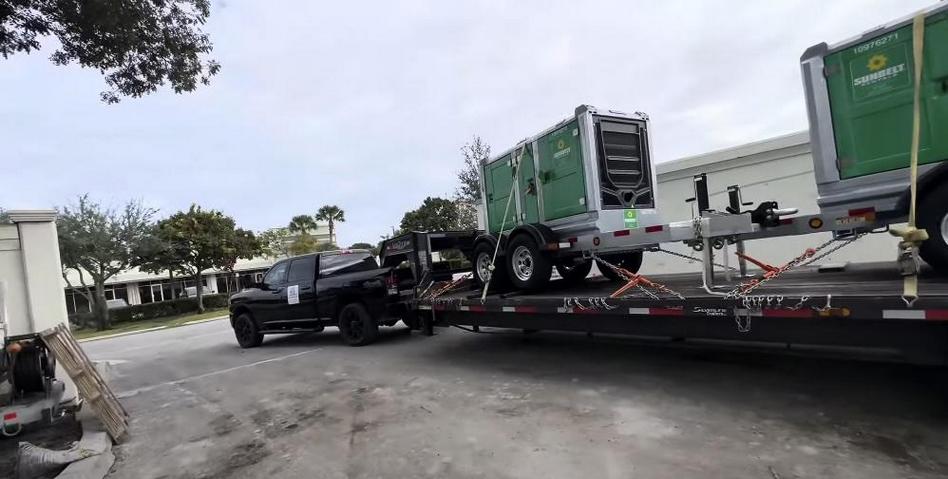 Pickup Truck Transporting Wheeled Container